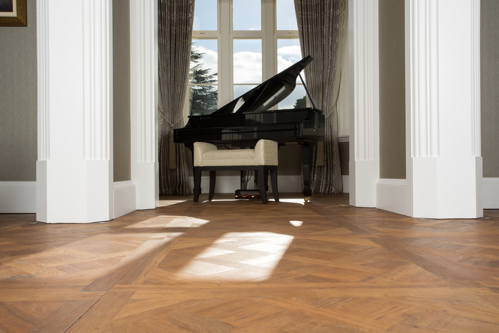 Oak Versailles panels parquet flooring with piano