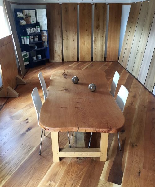 Waney Edge Solid Oak Slab Table in Leicestershire Wood Flooring Showroom